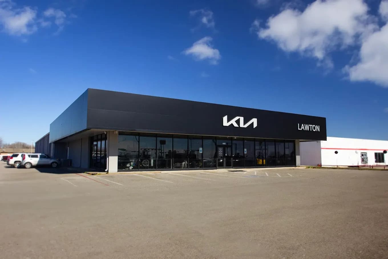 Lawton Kia business background image